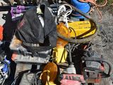 a pile of tools that are sitting on a pallet