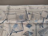 a piece of paper with drawings on it on a table