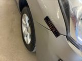 a close up of a car with a sticker on the front of it