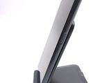 a cell phone that is sitting on top of a stand