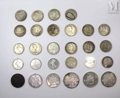 a lot of coins that are on the table