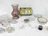 a table with a lot of glass items on it