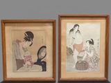 two framed asian prints of a woman and a child on a table