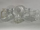 a lot of glass items that are on a table