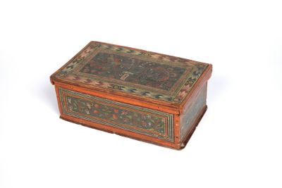 a small wooden box with a floral design on it