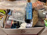 a box full of items that are sitting on a table