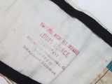 a small piece of fabric with a small patch on it