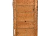an image of a wooden cabinet with a door open on a white background