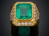 an emerald and diamond ring