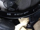 a close up of a steering belt on a car