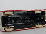 a small red and white box that has a black and white label on it