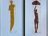 two framed pictures of a woman holding an umbrella and a man holding an umbrella