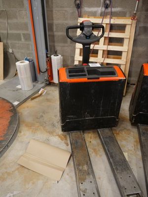 two pallets that are sitting next to each other in a room