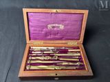 a wooden box with a set of silverware in it