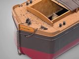 a small boat that is sitting in the sand