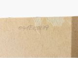 an image of a close up of a piece of cardboard with writing on it