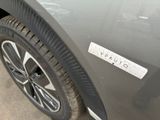 a close up of a car with a sticker on it