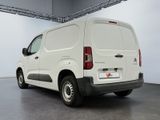 a white van that is parked in a garage