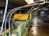 a large machine that is sitting inside of a building