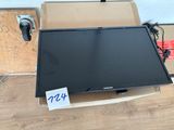 a television that is sitting in a box on the floor