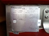 a close up of a payphone with a paper on it
