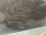 a person holding a piece of paper with writing on it