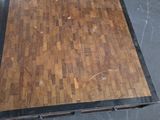 a wooden floor that has been laid out on the floor
