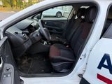 a car with the door open and the driver ' s seat down