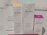 trois boîtes de produits du Dr C. Tunana posées les unes à côté des autres