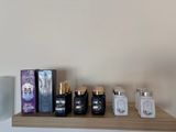 a shelf with a lot of bottles and containers on it