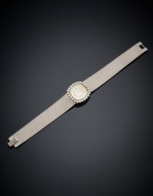 a lady ' s wrist watch with a diamond set clasp