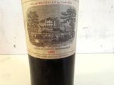 a bottle of wine that is sitting on a table