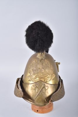 an old helmet with a fur ball on top of it