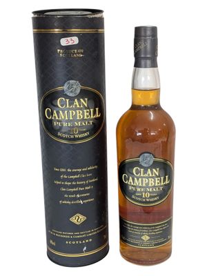 a bottle of clan campbell single malt whisky next to a cardboard box