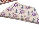 two pieces of cloth with different designs on them