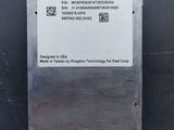 the back of a metal box with a white sticker on it