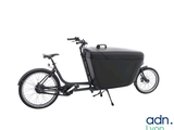 an image of a black bike with a basket on the back