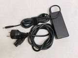 a charger and a power cord on a table