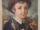 portrait d'un garçon avec un pistolet et un chapeau, dans un cadre