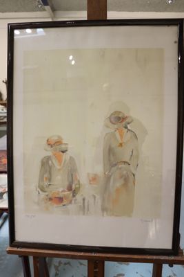 a picture of a painting on a easel in a room