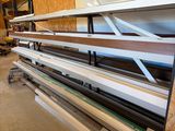 a lot of shelves that are stacked up in a room