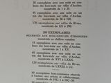 a black and white photograph of a menu on a table