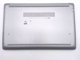 a laptop that is sitting on a white surface