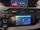 a picture of a car dashboard with a display on it