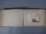 an open book with a picture of a cat on it
