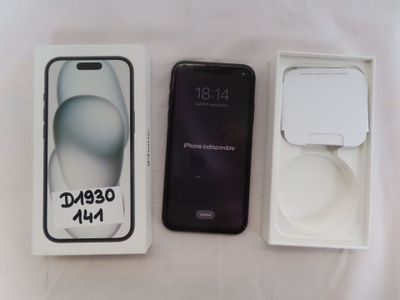 une image représentant une boîte contenant un téléphone, posée sur une table