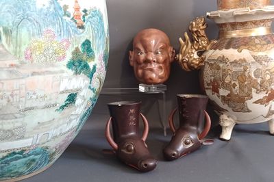 many vases and vases that are sitting on a table