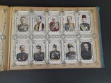 an open book with pictures of military men in uniform on it
