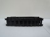 a black train car that is sitting on a table