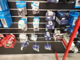 many different types of electronics on display in a store